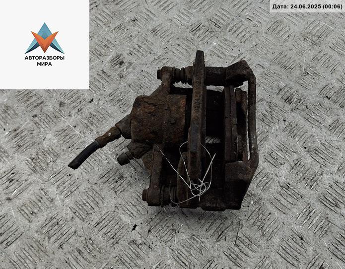 суппорт передний левый Ford Mondeo 3 поколение 2001, 2.0 л., бензин, МКПП, зелёный, универсал - фото №1