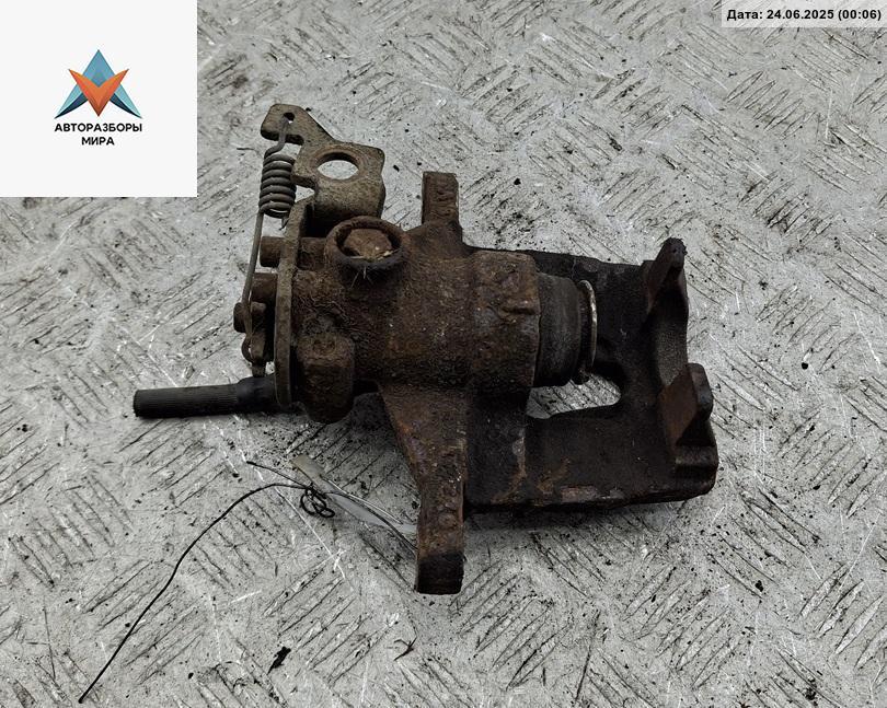 суппорт задний левый Ford Mondeo 3 поколение 2001, 2.0 л., бензин, МКПП, зелёный, универсал - фото №1