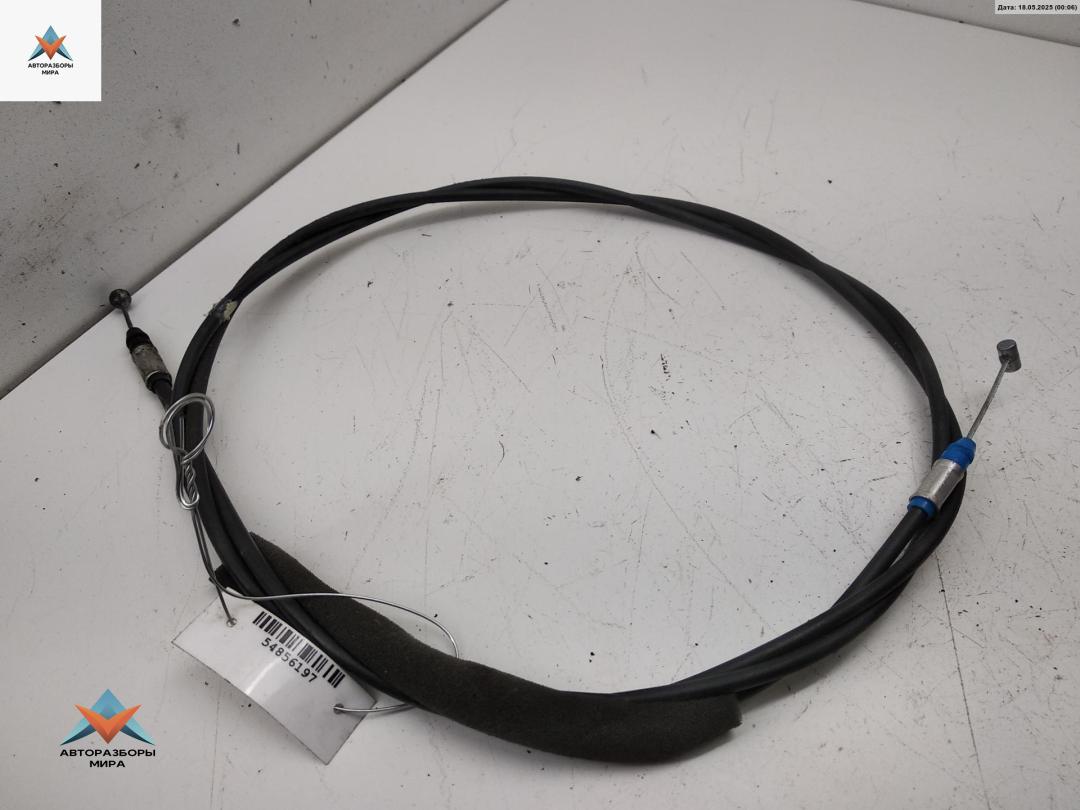 трос капота Mazda 323 BA 1997, 1.5 л., бензин, МКПП, синий, хетчбэк 5 дв. - фото №1