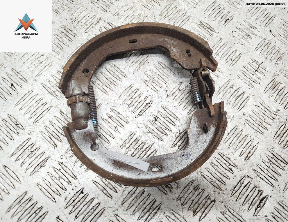 Механизм развода задних тормозных колодок правый BMW 5 серия E60/E61 2004, 2.5 л., бензин, МКПП, чёрный, универсал - фото №1