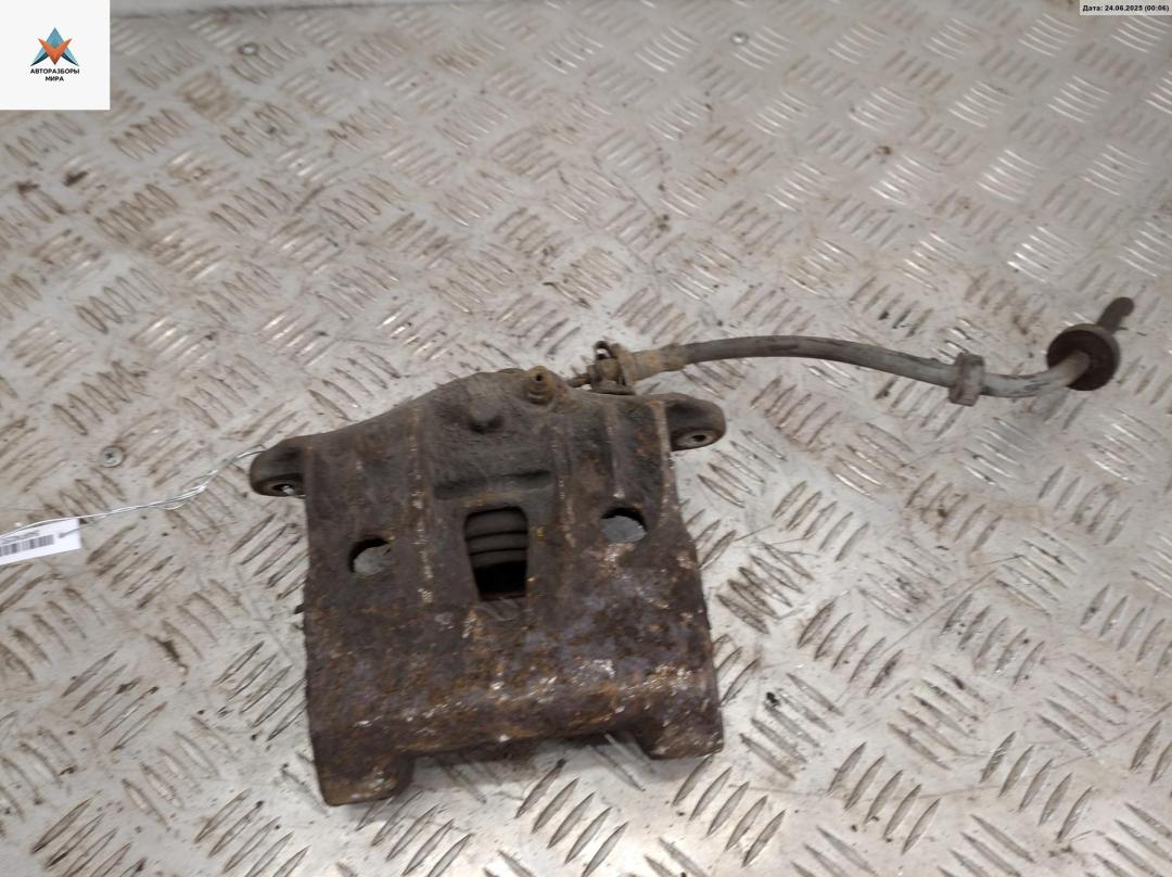 суппорт передний левый Volkswagen Transporter T4 1997, 2.4 л., дизель, МКПП, зелёный, микроавтобус - фото №1