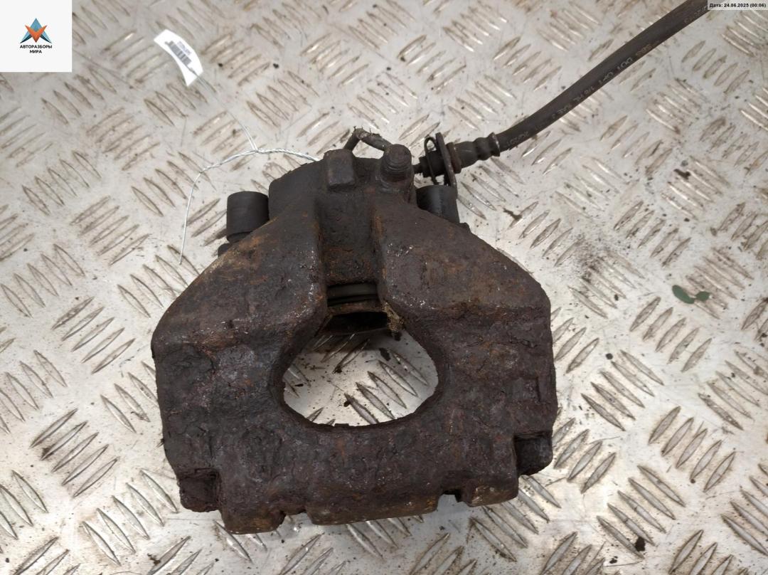 суппорт передний левый Volkswagen Transporter T4 1997, 2.5 л., дизель, МКПП, красный, микроавтобус - фото №1