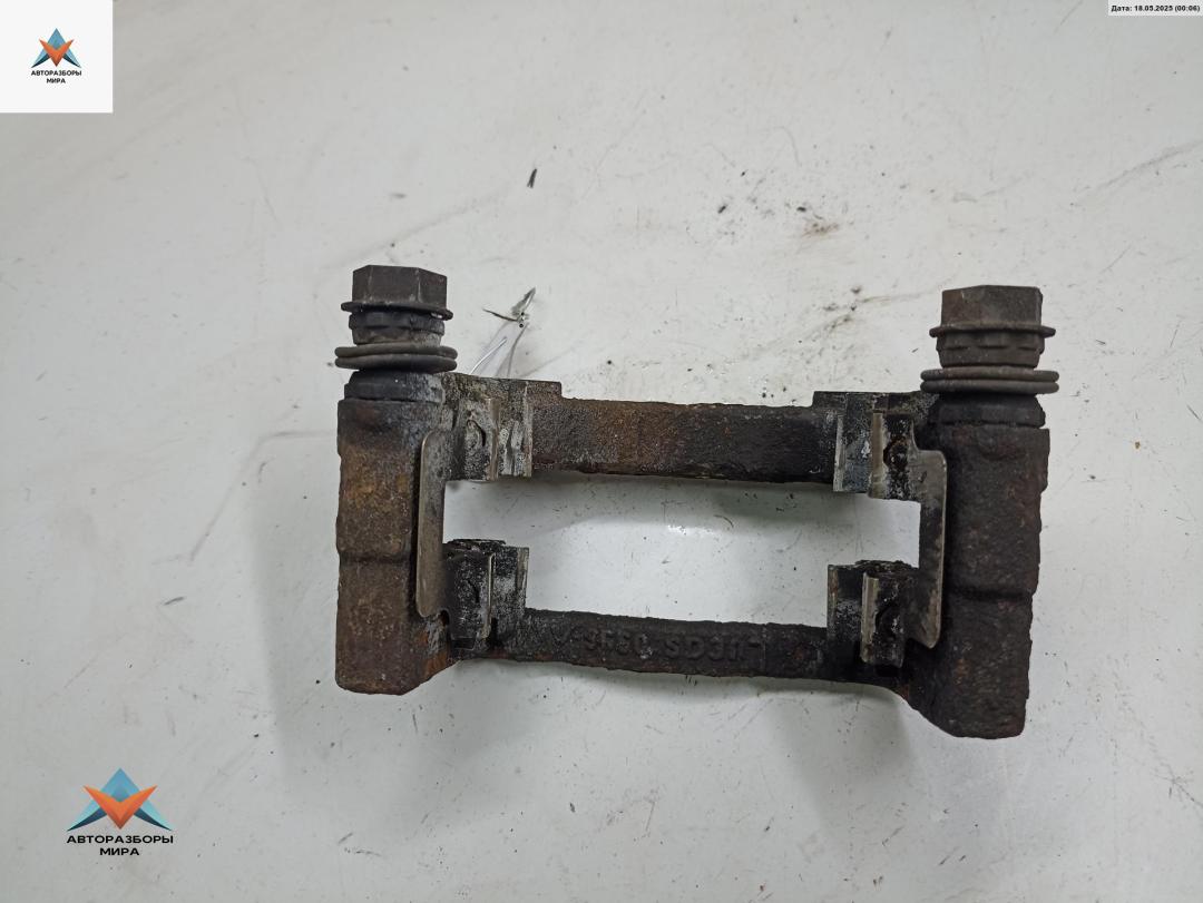 скоба суппорта Opel Astra H 2004, 1.4 л., бензин, МКПП, серый, хетчбэк 5 дв. - фото №1