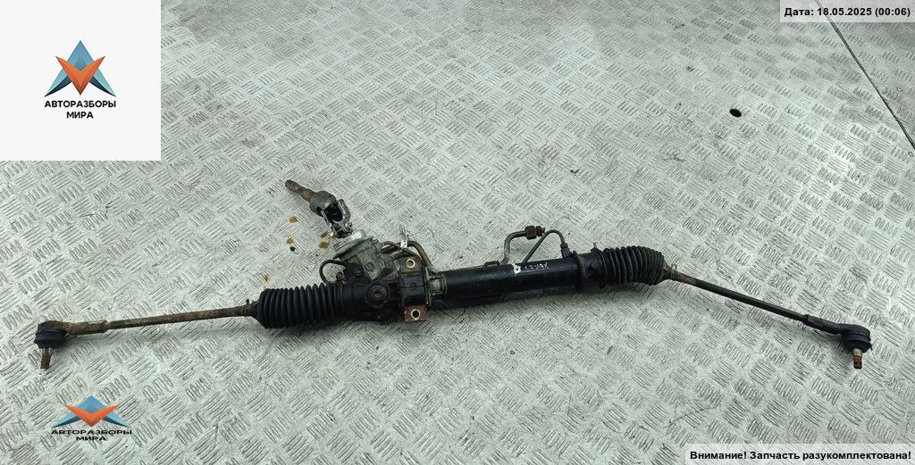 рулевая рейка Mazda 323 BA 1997, 1.5 л., бензин, МКПП, синий, хетчбэк 5 дв. - фото №1