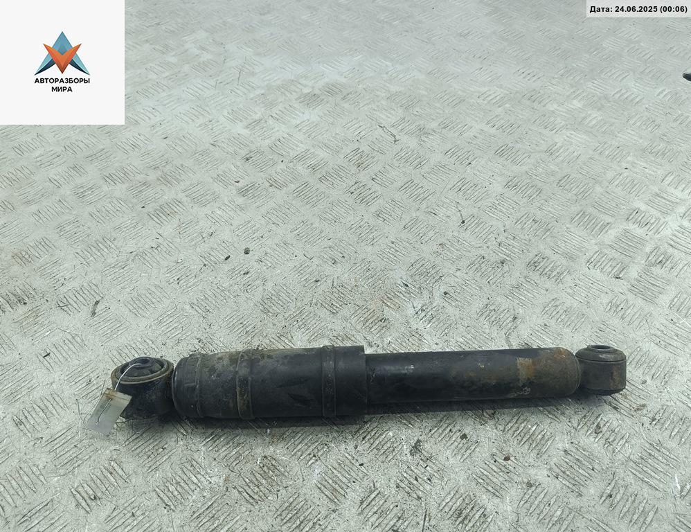 амортизатор задний левый Opel Astra G 2001, 1.6 л., бензин, МКПП, серый, хетчбэк 5 дв. - фото №1