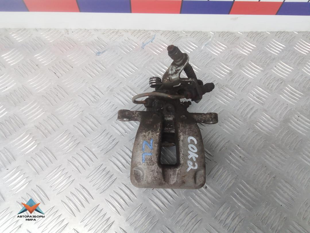 суппорт задний левый Volkswagen Golf 6 поколение 2008, 1.9 л., дизель, МКПП, универсал - фото №1