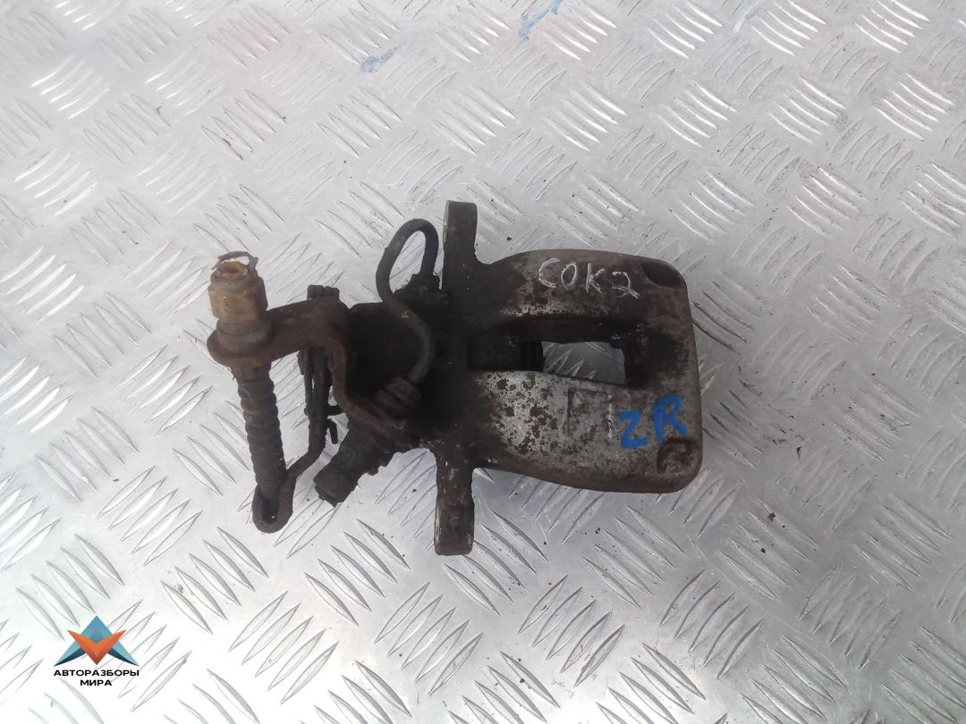 суппорт задний правый Volkswagen Golf 6 поколение 2008, 1.9 л., дизель, МКПП, универсал - фото №1