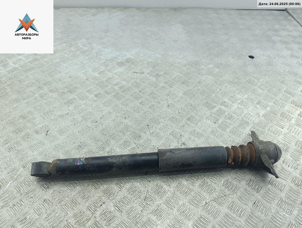 амортизатор задний левый Volkswagen Passat B6 2008, 1.8 л., бензин, МКПП, синий, универсал - фото №1