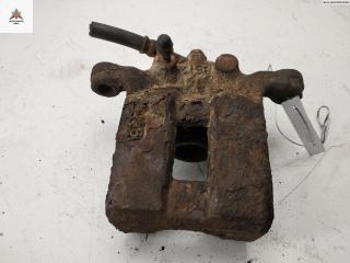 суппорт задний левый Nissan X-Trail T30 [рестайлинг] 2004, 2.2 л., дизель, МКПП, чёрный, внедорожник 5 дв.