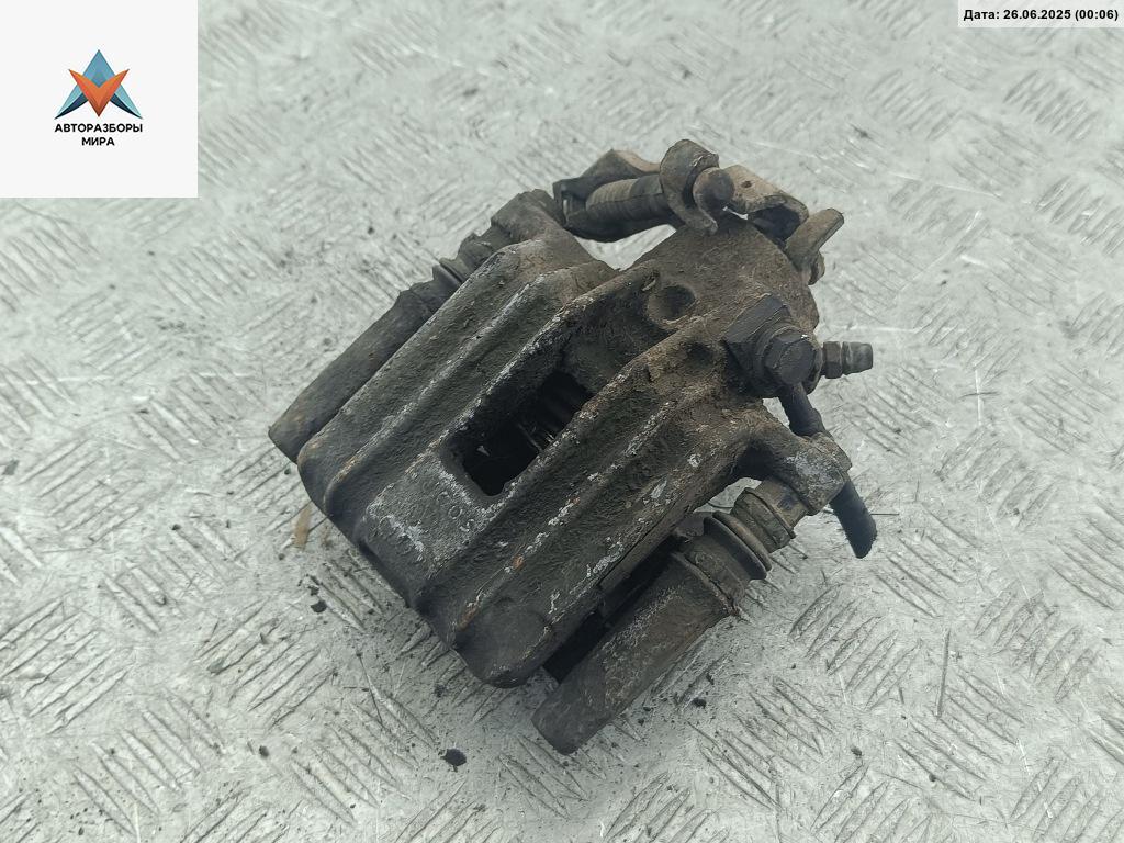 суппорт задний правый Volkswagen Golf 4 поколение 2000, 1.9 л., дизель, МКПП, серый, универсал - фото №1