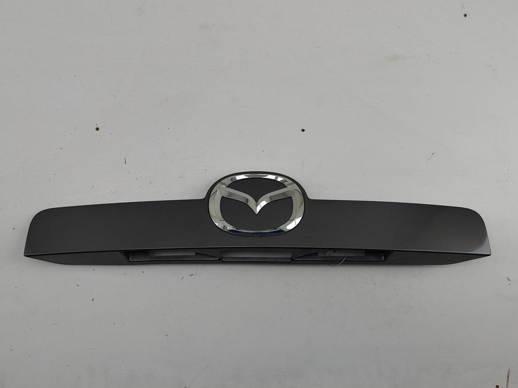накладка подсветки номера Mazda CX-7 2007, 2.3 л., бензин, МКПП, серый, внедорожник 5 дв., EG2150811