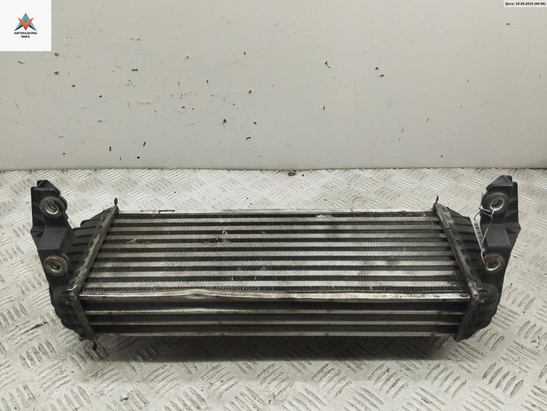 радиатор интеркулера Ford Tourneo Connect 1 поколение 2008, 1.8 л., дизель, МКПП, серый, фургон, 7T169L440AD - фото №1