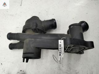 корпус термостата Skoda Fabia 1 поколение (6Y) [рестайлинг] 2005, 1.2 л., бензин, МКПП, чёрный, хетчбэк 5 дв., 03C121111B