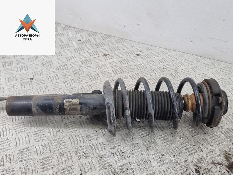 стойка передняя Volkswagen Touran 1 поколение 2005, 2.0 л., дизель, АКПП, красный, минивэн - фото №1