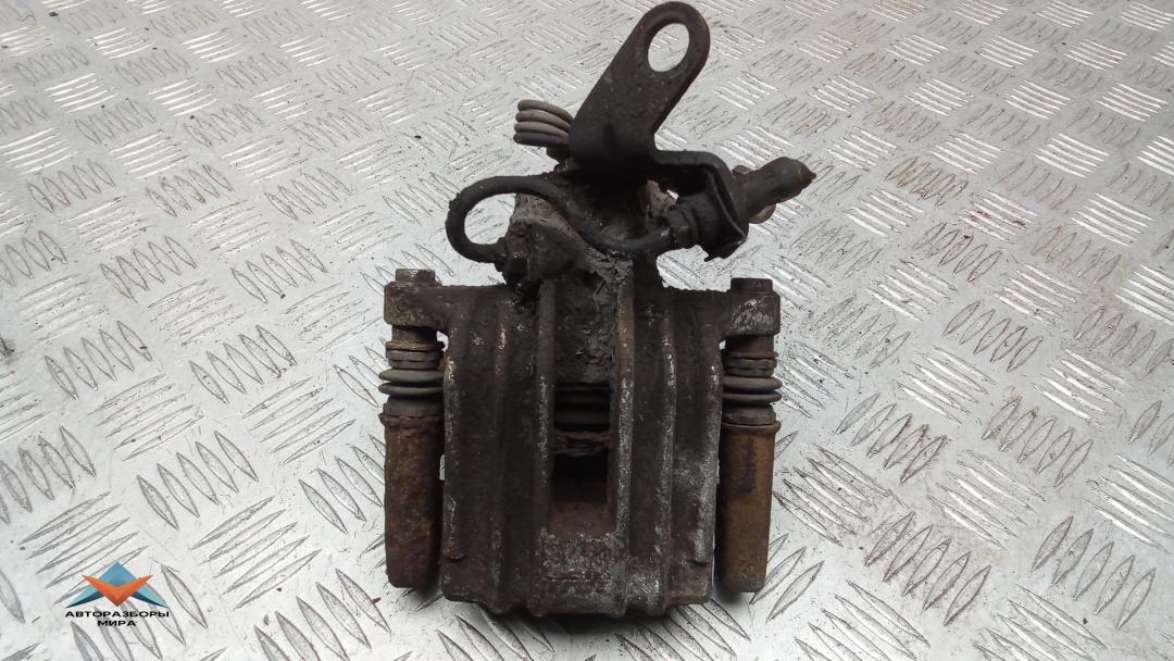 суппорт задний левый Volkswagen Golf 6 поколение 2009, 2.0 л., дизель, МКПП, хетчбэк 5 дв., 1K0615423J - фото №1