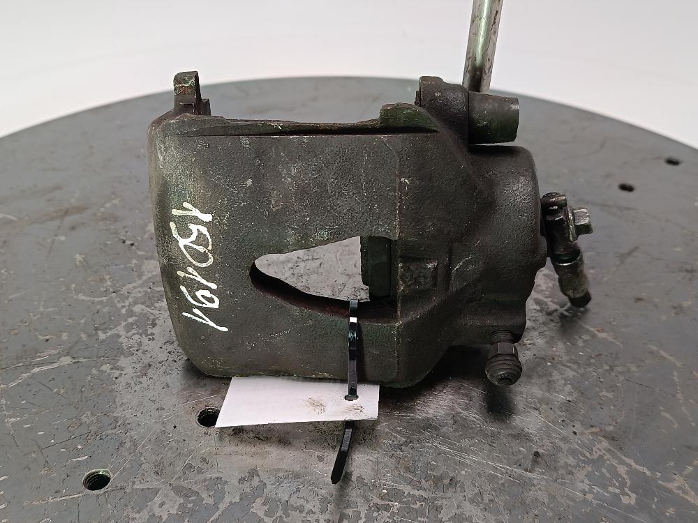 суппорт передний левый Volkswagen Golf 6 поколение 2008, цвет - фото №1