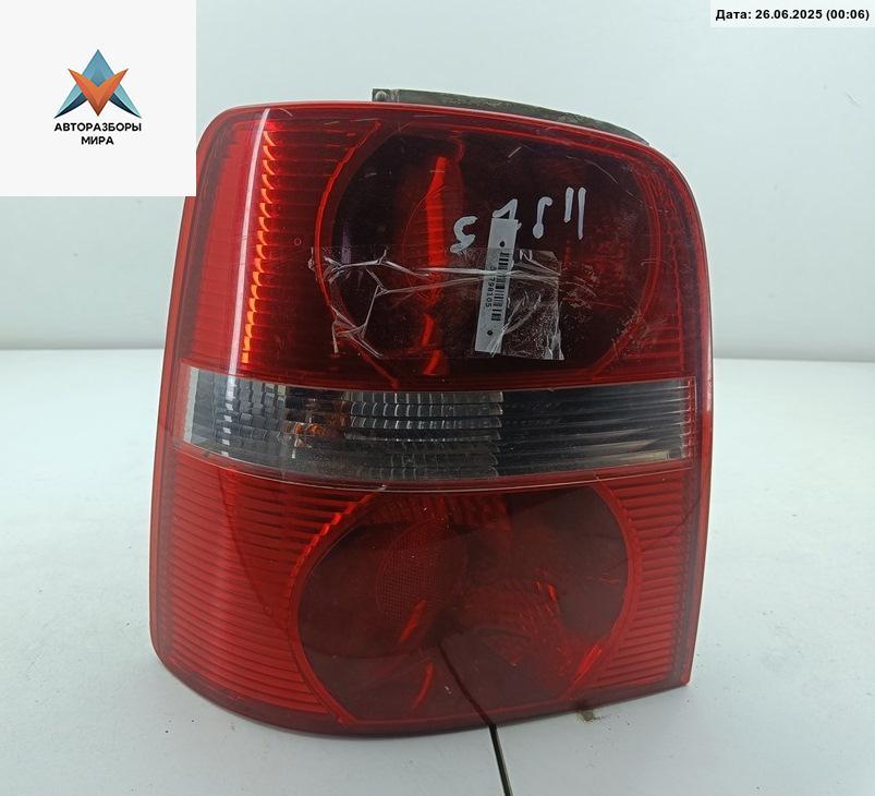фонарь задний левый Volkswagen Touran 1 поколение 2003, 2.0 л., дизель, МКПП, чёрный, минивэн, 1T0945095F - фото №1