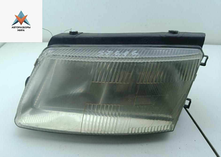 фара левая Volkswagen Passat B5 1997, 1.6 л., бензин, МКПП, серый, седан - фото №1