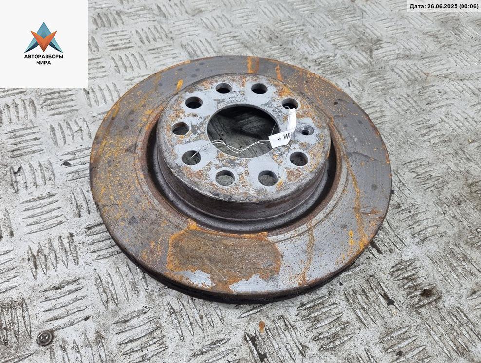 диск тормозной передний SEAT Leon 2 поколение 2006, 1.6 л., бензин, МКПП, жёлтый, хетчбэк 5 дв. - фото №1