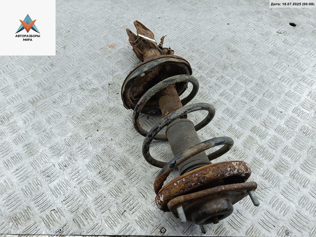 стойка передняя Mitsubishi Lancer 9 поколение 2003, 1.6 л., бензин, МКПП, чёрный, универсал - фото №1