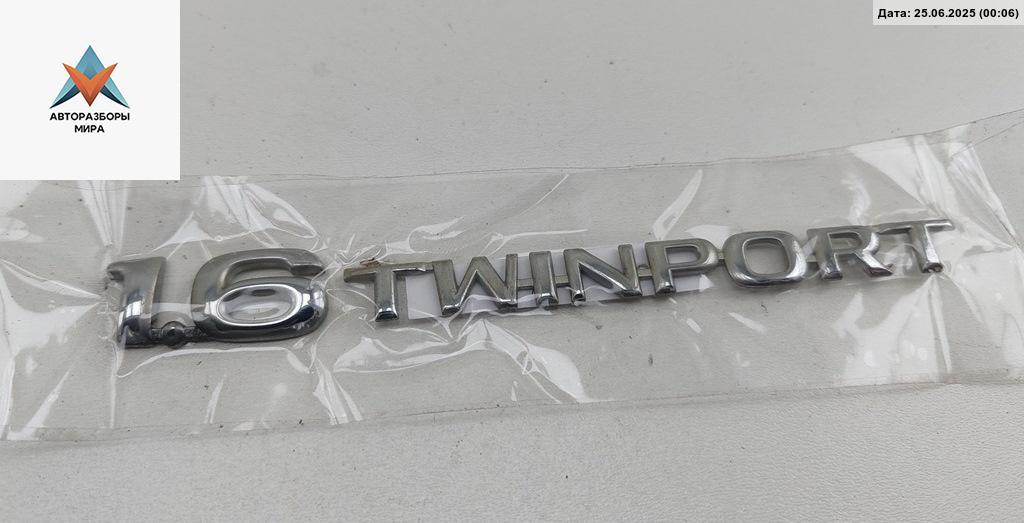 эмблема Opel Astra G 2003, 1.6 л., бензин, МКПП, серый, универсал - фото №1