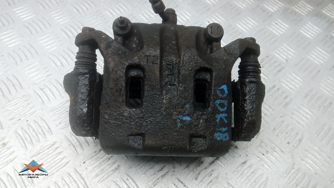 суппорт передний левый Nissan Pathfinder R51 2005, 2.5 л., дизель, МКПП, внедорожник 5 дв. - фото №1