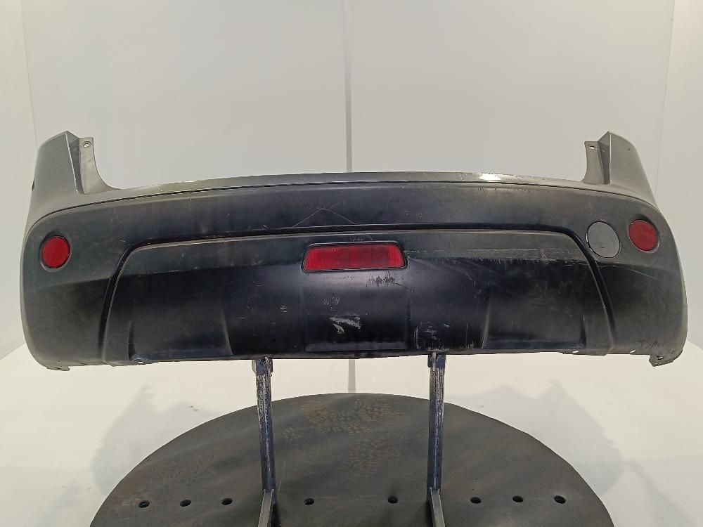 бампер задний Nissan Qashqai 1 поколение 2009, цвет, 85022JD00H - фото №1