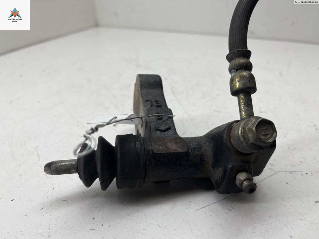 цилиндр сцепления рабочий Nissan Almera N16 2000, 1.5 л., бензин, МКПП, синий, хетчбэк 5 дв. - фото №1