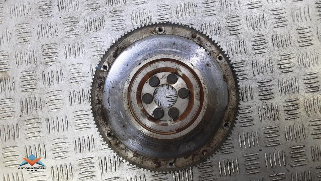 маховик Skoda Rapid 1 поколение 2014, 1.2 л., бензин, МКПП, хетчбэк 5 дв., 036105269M - фото №1