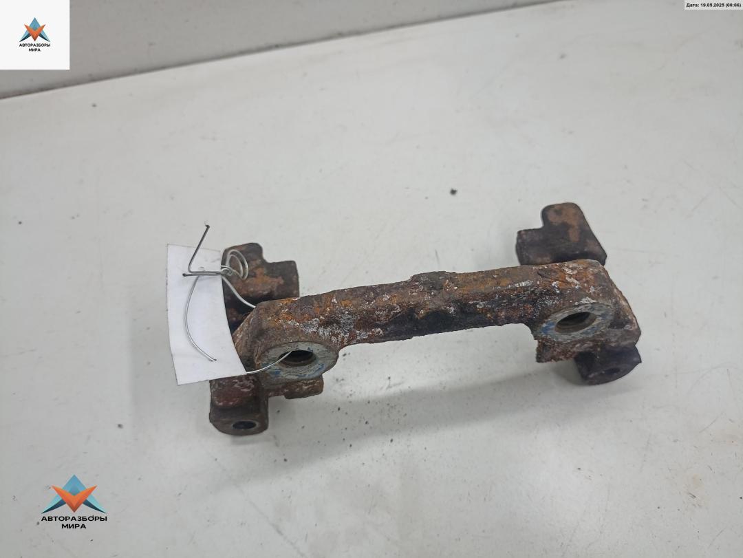 скоба суппорта Opel Vectra C 2002, 2.0 л., дизель, МКПП, серый, седан - фото №1