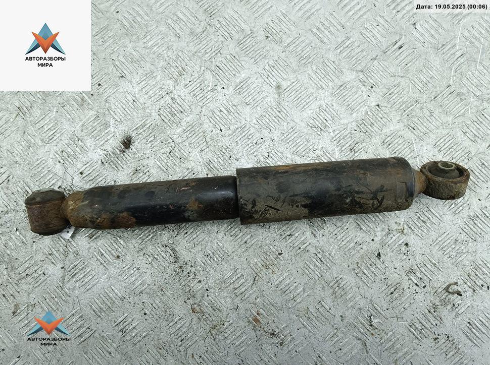 амортизатор задний левый Fiat Stilo 1 поколение 2007, 1.9 л., дизель, МКПП, синий, универсал - фото №1