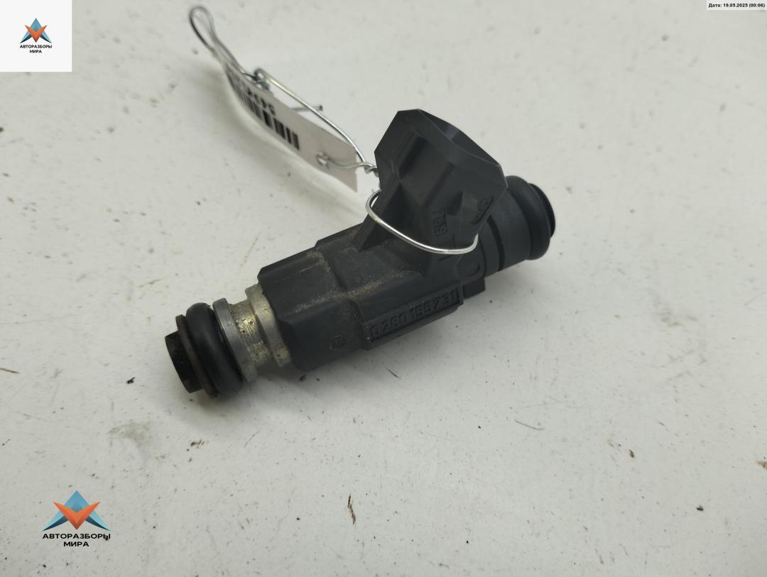 форсунка Volkswagen Polo 3 поколение 1997, 1.4 л., бензин, МКПП, синий, седан, 030906031E - фото №1