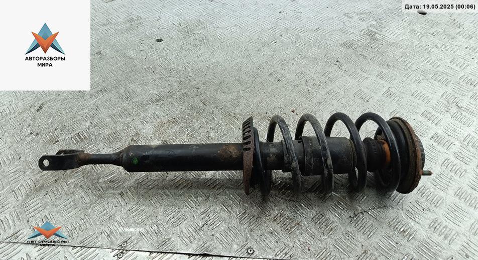 стойка передняя Volkswagen Passat B5 1998, 1.8 л., бензин, МКПП, зелёный, универсал - фото №1