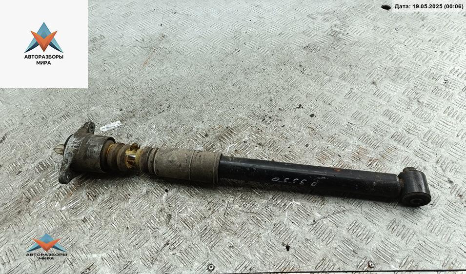 амортизатор задний левый Volkswagen Passat B5 1998, 1.8 л., бензин, МКПП, зелёный, универсал - фото №1