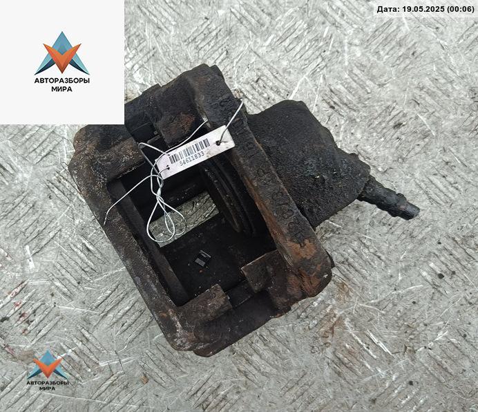 суппорт передний правый Dacia (Renault) Sandero I 2009, 1.2 л., бензин, МКПП, красный, хетчбэк 5 дв. - фото №1