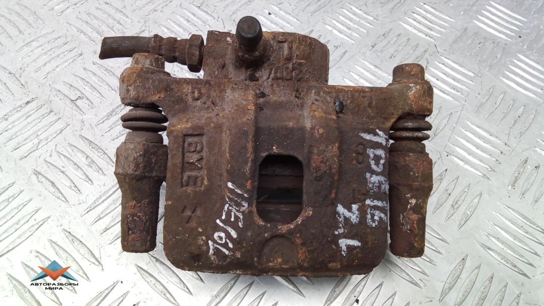 суппорт задний левый Mitsubishi Lancer 9 поколение 2006, 2.0 л., бензин, МКПП, универсал - фото №1