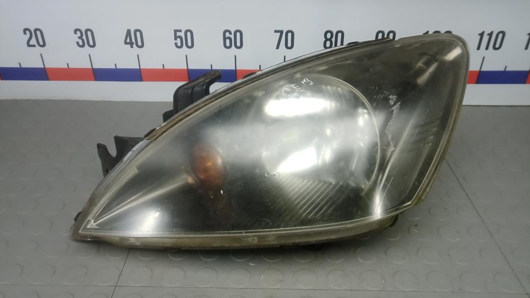 фара левая Mitsubishi Lancer 10 поколение 2007, 1.6 л., бензин, МКПП, универсал - фото №1