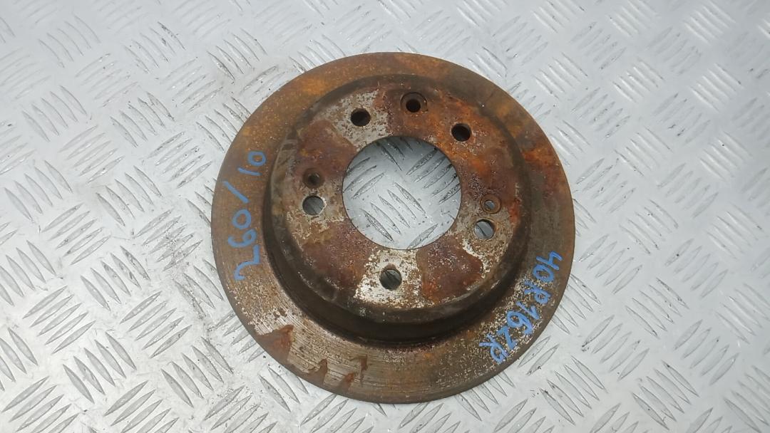 диск тормозной задний Hyundai ix35 1 поколение 2012, 1.7 л., дизель, МКПП, внедорожник 5 дв., 584111H100 - фото №1