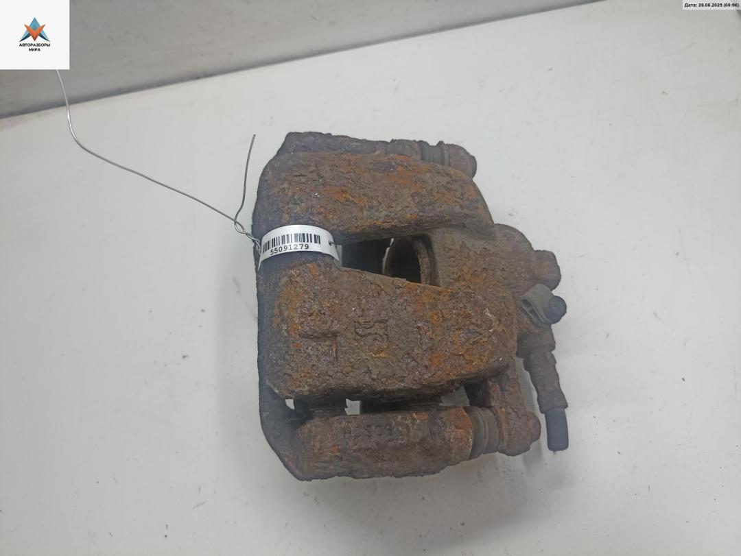 суппорт передний левый Opel Corsa D 2007, 1.0 л., бензин, МКПП, чёрный, хетчбэк 3 дв. - фото №1