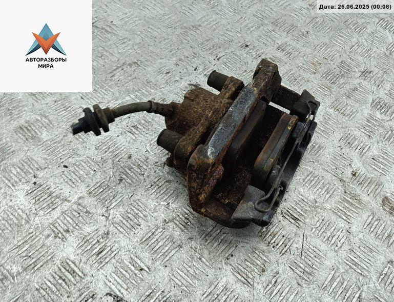 суппорт передний левый Renault Captur 1 поколение 2016, 1.2 л., бензин, АКПП, серый, внедорожник 5 дв. - фото №1