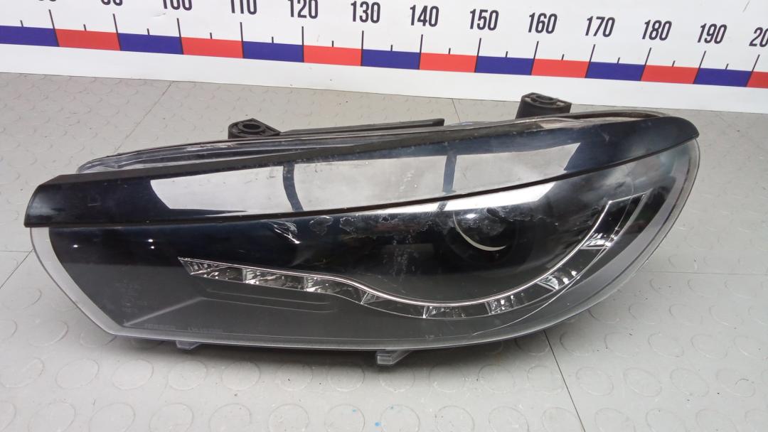 фара левая Volkswagen Scirocco 3 поколение 2011, 2.0 л., дизель, МКПП, хетчбэк 5 дв., 1K8941005J - фото №1