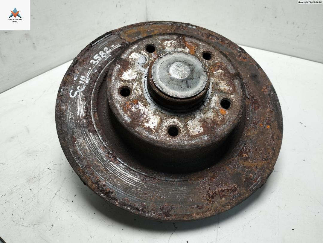 ступица задняя левая Renault Scenic 3 поколение 2011, 1.4 л., бензин, МКПП, чёрный, минивэн - фото №1