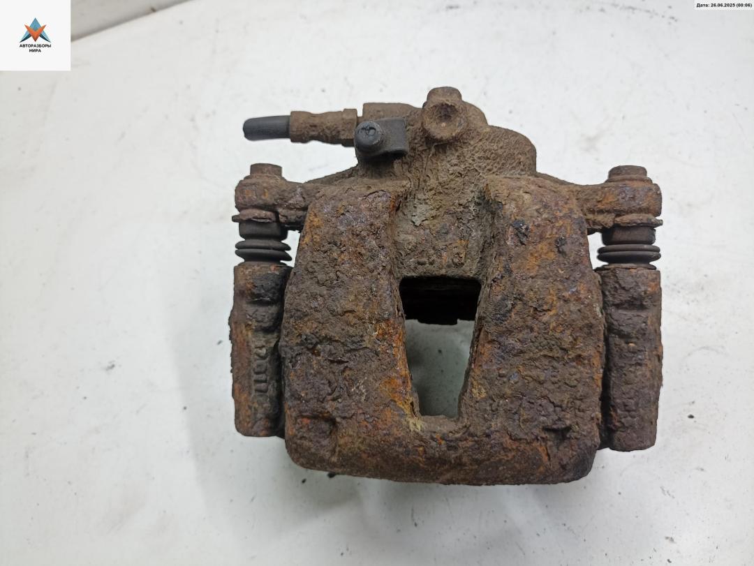 суппорт передний правый Opel Corsa D 2007, 1.0 л., бензин, МКПП, чёрный, хетчбэк 3 дв. - фото №1