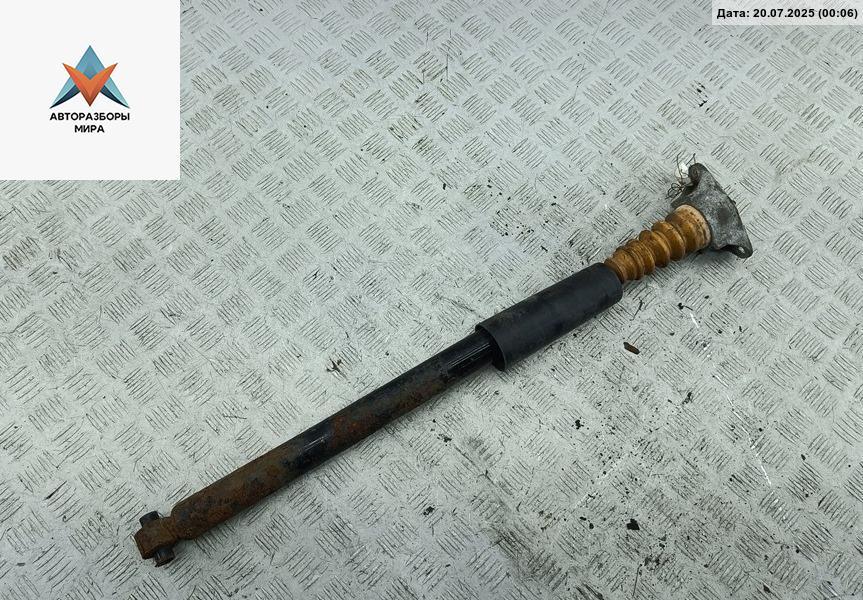 амортизатор задний левый Mazda 3 BK 2004, 1.6 л., бензин, МКПП, красный, хетчбэк 5 дв. - фото №1