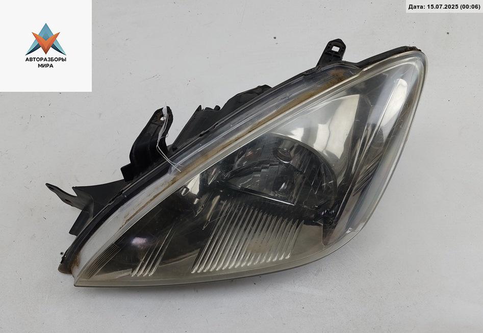 фара левая Mitsubishi Lancer 9 поколение 2003, 2.0 л., бензин, МКПП, синий, универсал - фото №1