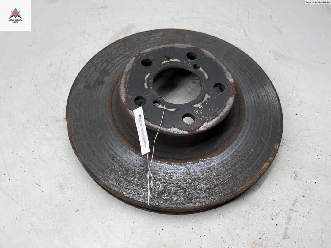 диск тормозной передний Subaru Forester 1 поколение (SF) 1998, 2.0 л., бензин, МКПП, зелёный, внедорожник 5 дв. - фото №1