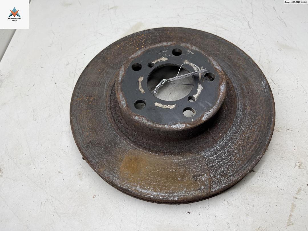 диск тормозной передний Subaru Forester 1 поколение (SF) 1998, 2.0 л., бензин, МКПП, зелёный, внедорожник 5 дв. - фото №1