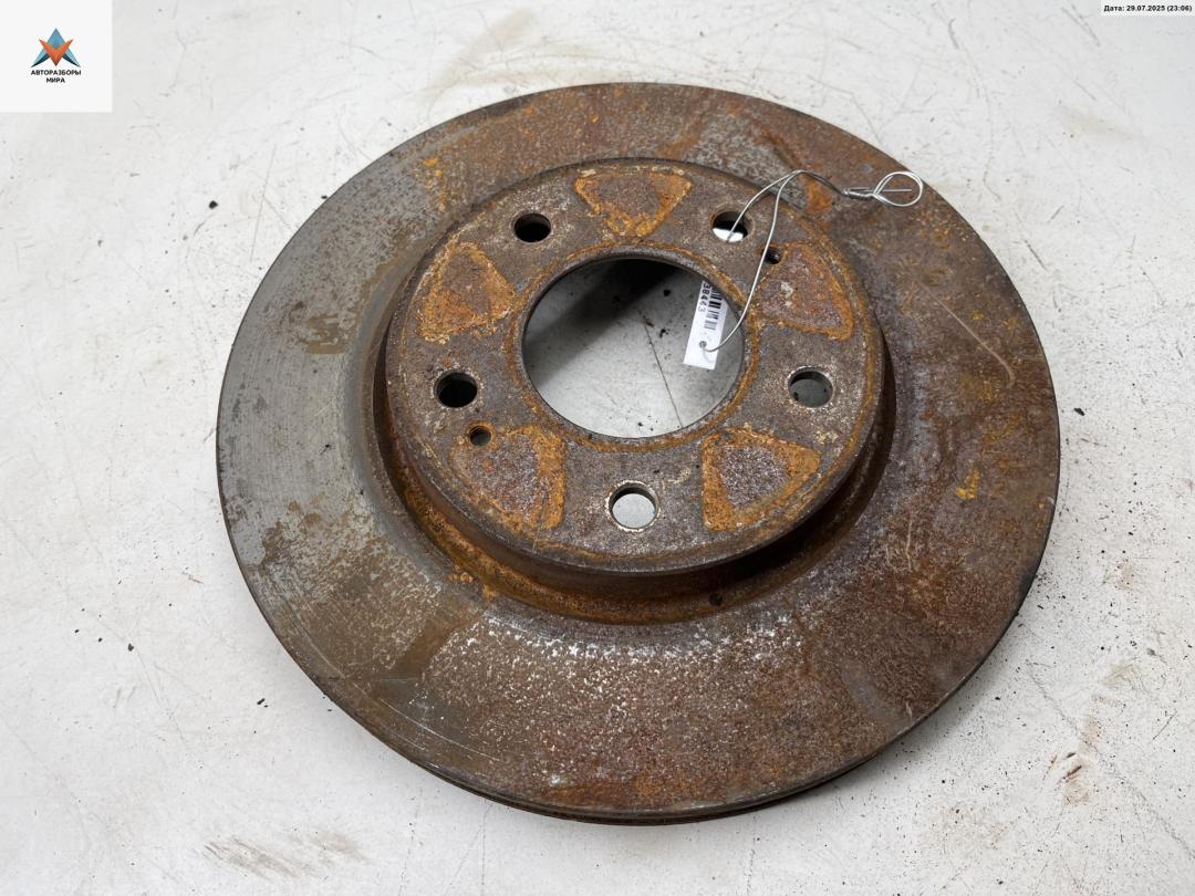 диск тормозной передний Mitsubishi Lancer 9 поколение 2003, 2.0 л., бензин, МКПП, синий, универсал - фото №1