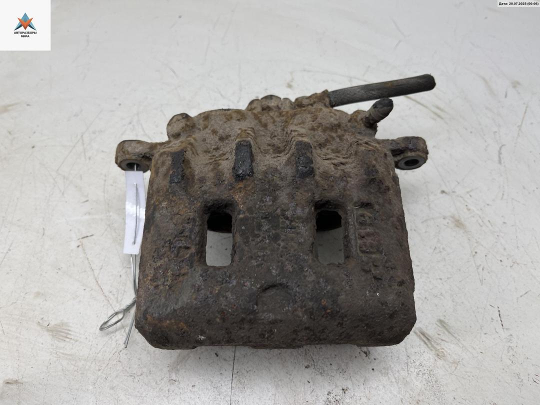 суппорт передний правый Subaru Forester 1 поколение (SF) 1998, 2.0 л., бензин, МКПП, зелёный, внедорожник 5 дв. - фото №1