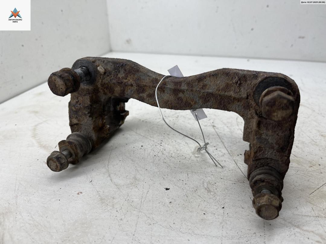 скоба суппорта Subaru Forester 1 поколение (SF) 1998, 2.0 л., бензин, МКПП, зелёный, внедорожник 5 дв. - фото №1